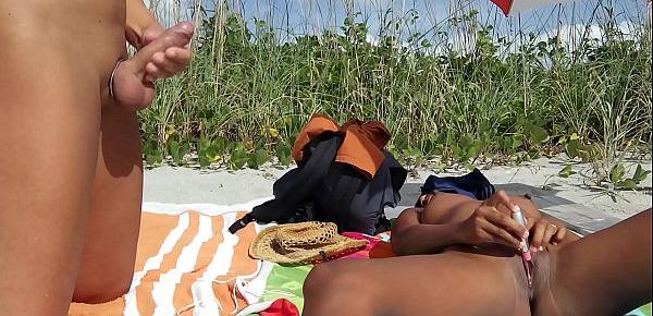  Public beach jerk off. Big cumshot on Aisanippie. Voyeurstyle.